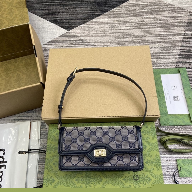 G*u*i top handle bags